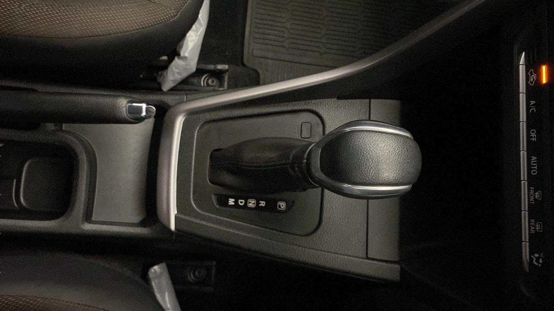 Gear lever console of a Maruti Suzuki Brezza