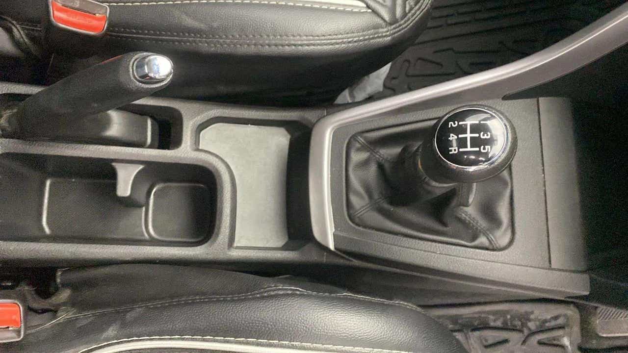 Gear shift and handbrake area of a Maruti Suzuki Brezza