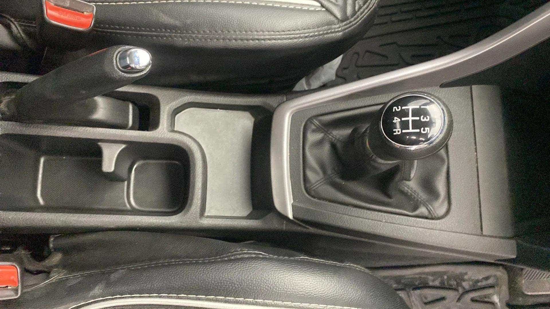 Gear shift and handbrake area of a Maruti Suzuki Brezza