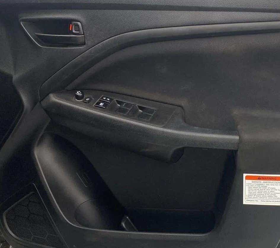 Driver side door panel of a Maruti Suzuki Brezza