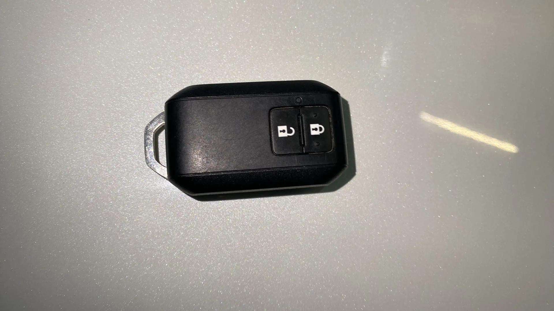Close-up of a car key fob of a Maruti Suzuki Brezza