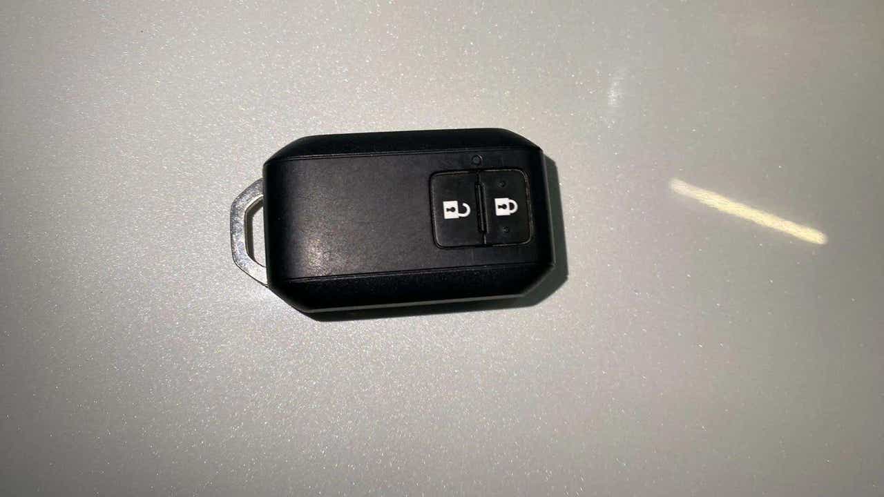Close-up of a car key fob of a Maruti Suzuki Brezza