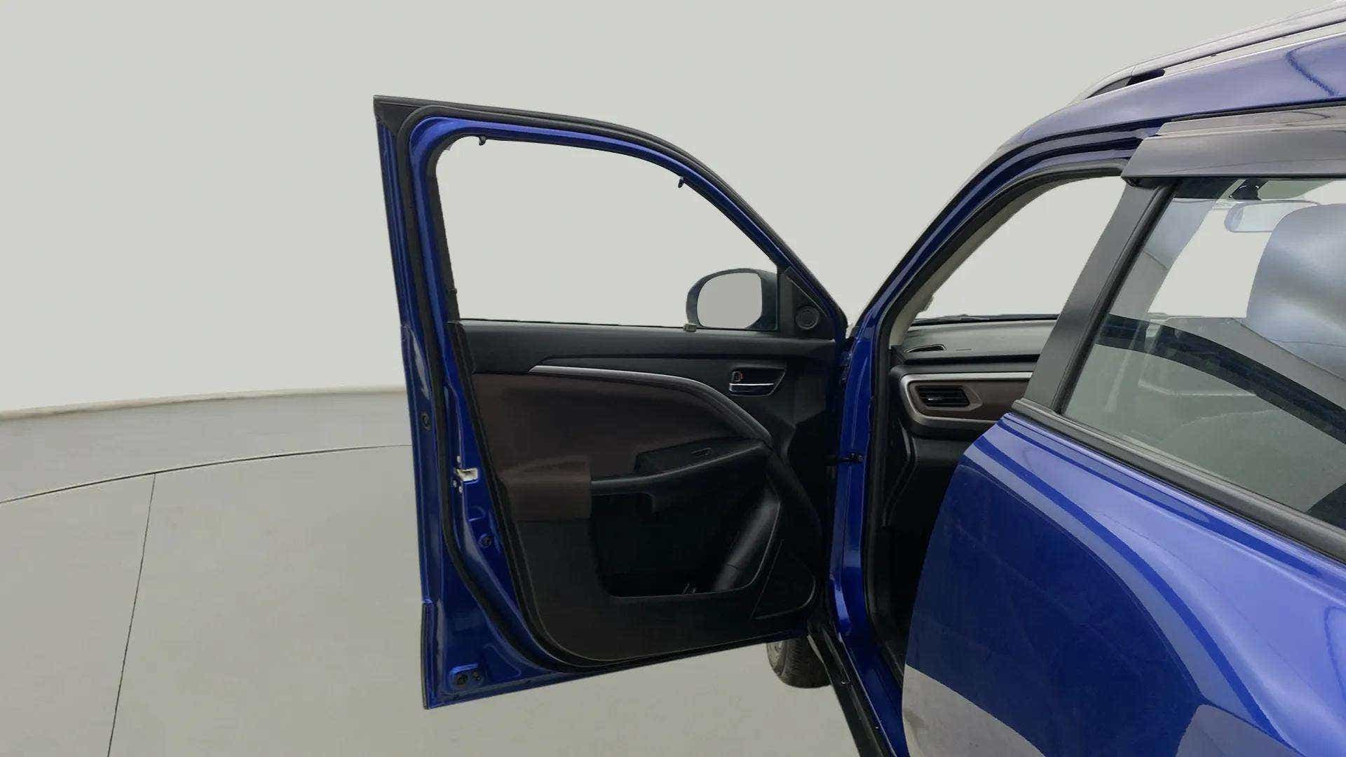 Front door open view of a Maruti Suzuki Brezza