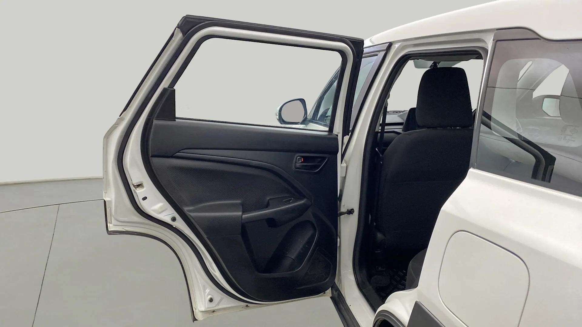 Rear door and interior view of a Maruti Suzuki Brezza