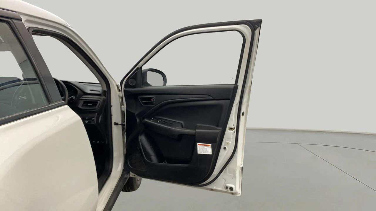 Front driver door open view of a Maruti Suzuki Brezza