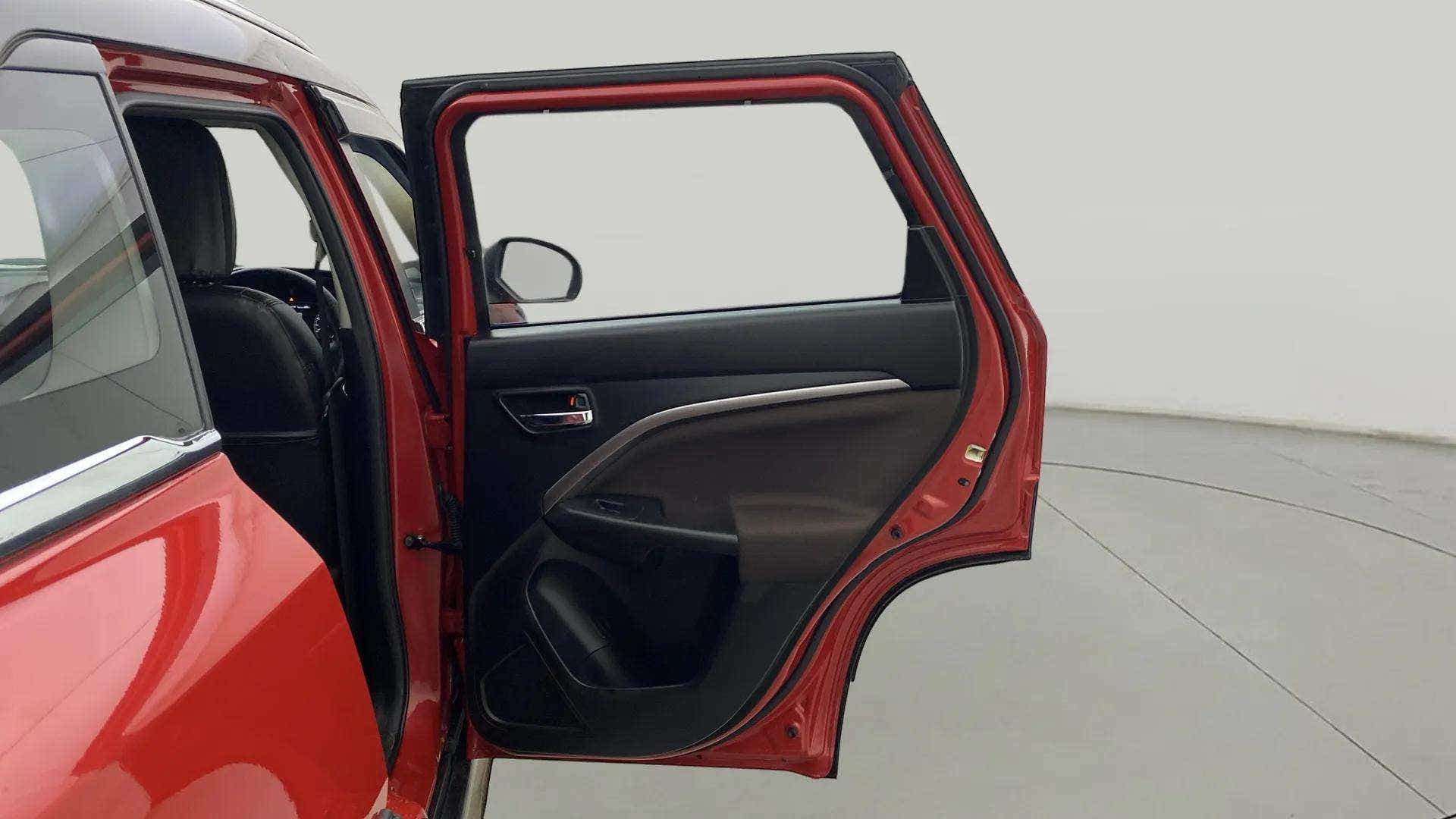Rear door open view of a Maruti Suzuki Brezza