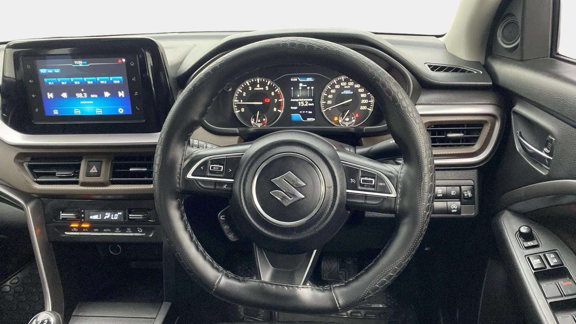 Dashboard and steering wheel of a Maruti Suzuki Brezza