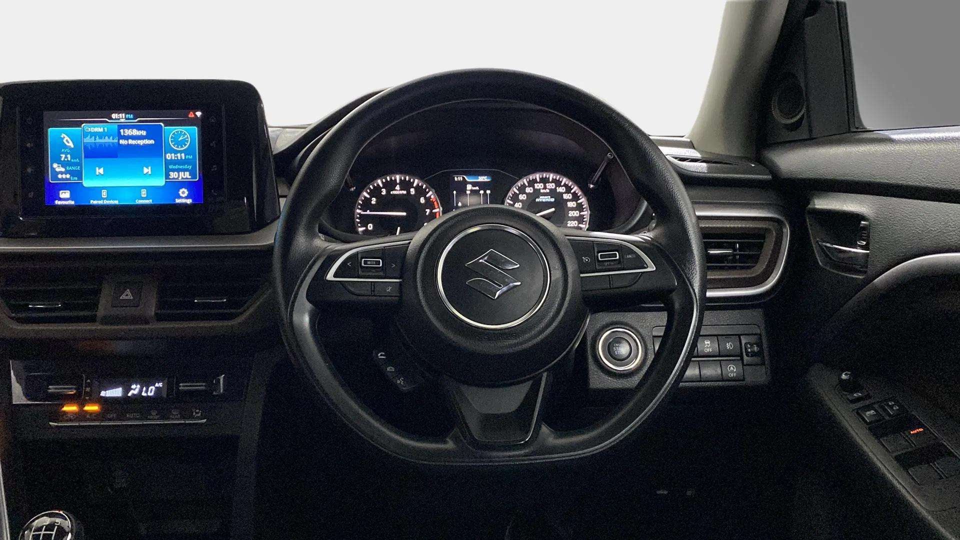 Dashboard and steering wheel view of a Maruti Suzuki Brezza