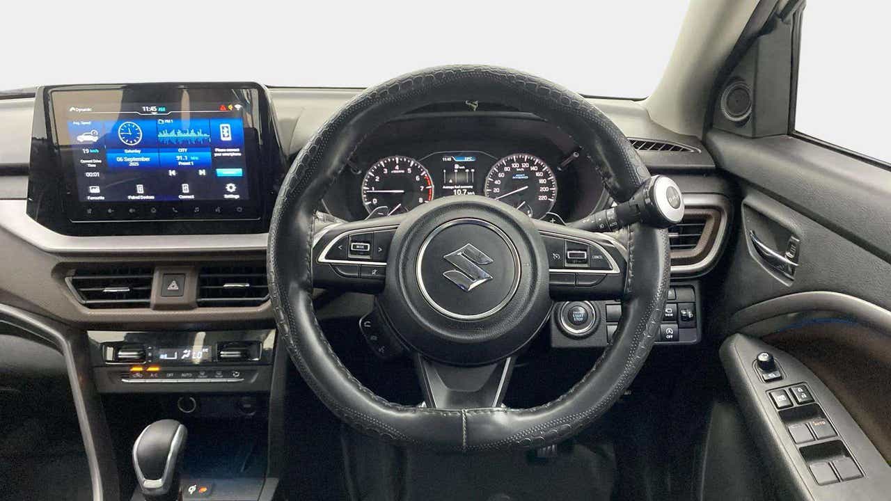 Dashboard and steering wheel of a Maruti Suzuki Brezza