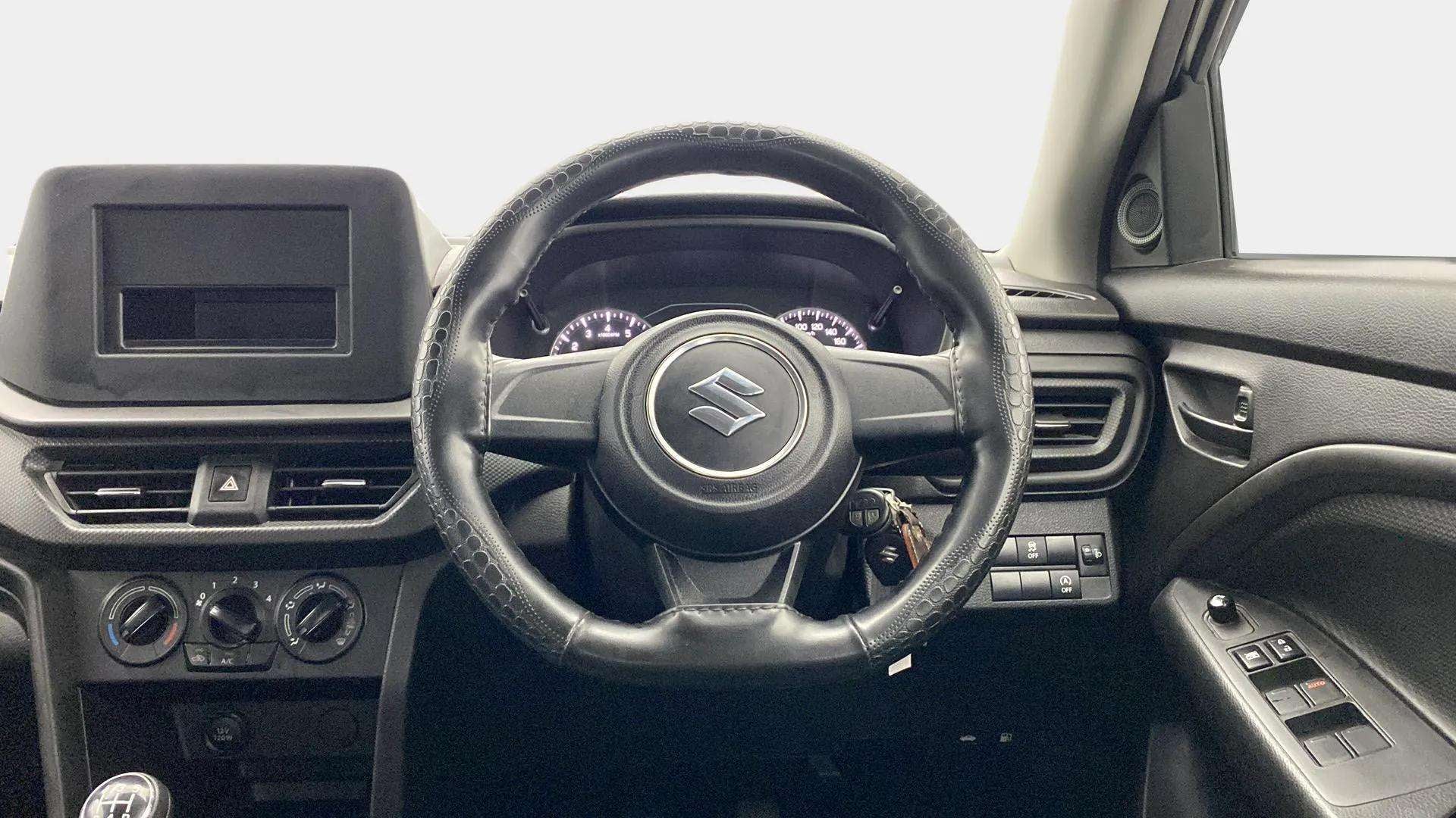 Interior dashboard view of a Maruti Suzuki Brezza