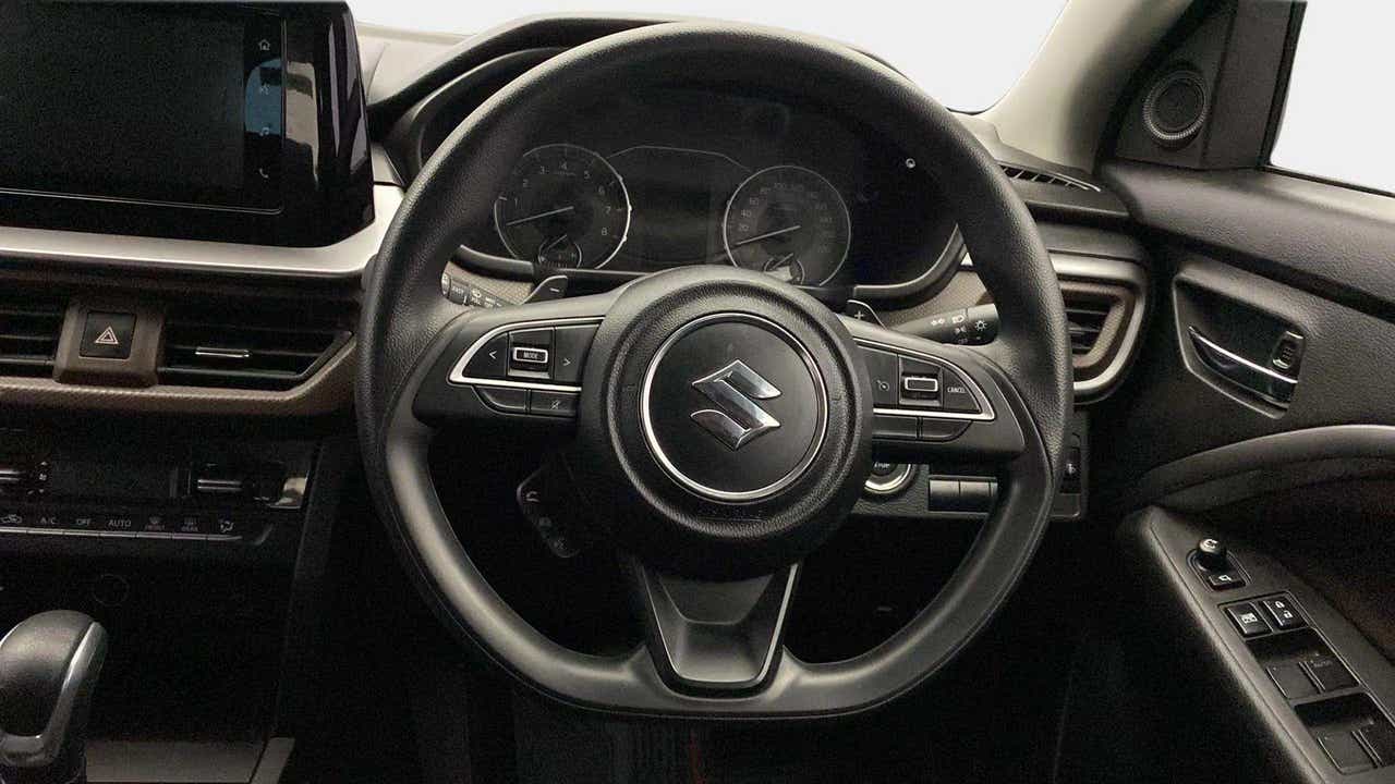 Steering wheel and dashboard of a Maruti Suzuki Brezza