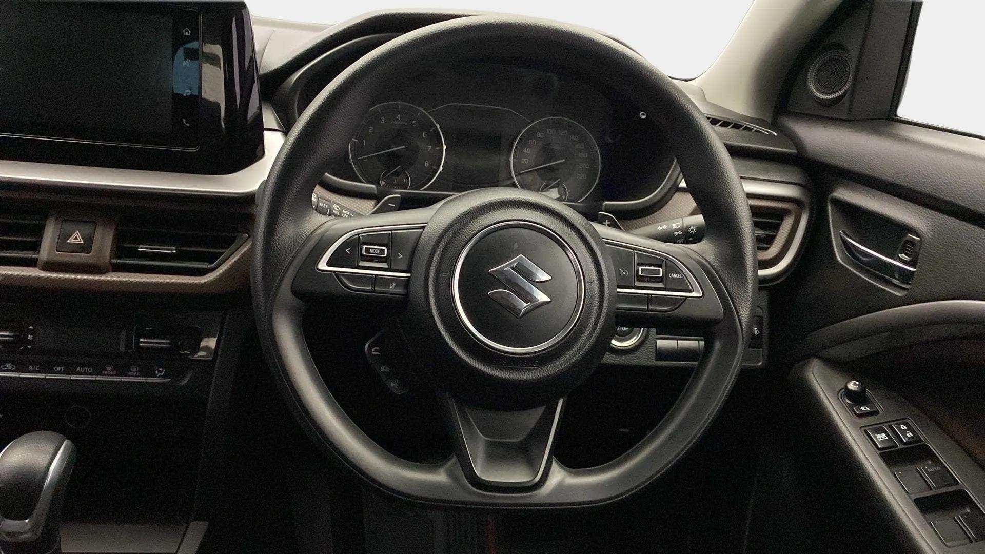 Steering wheel and dashboard of a Maruti Suzuki Brezza