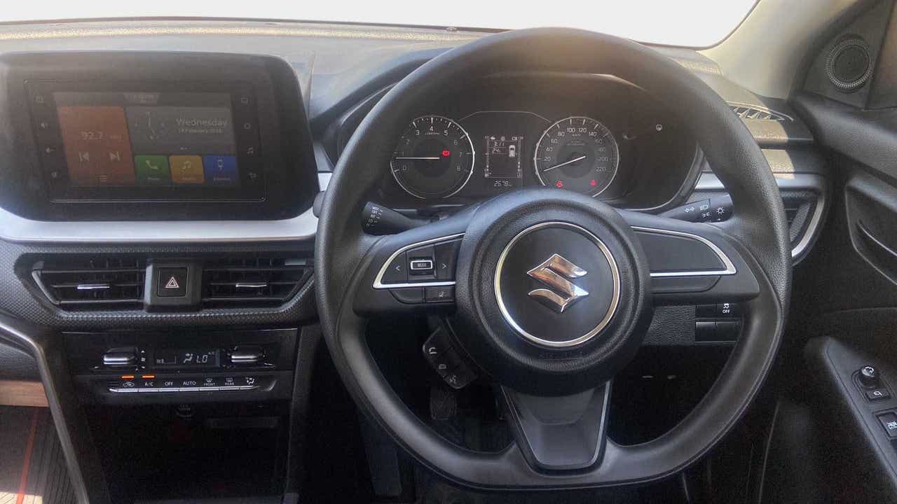 Interior dashboard view of a Maruti Suzuki Brezza
