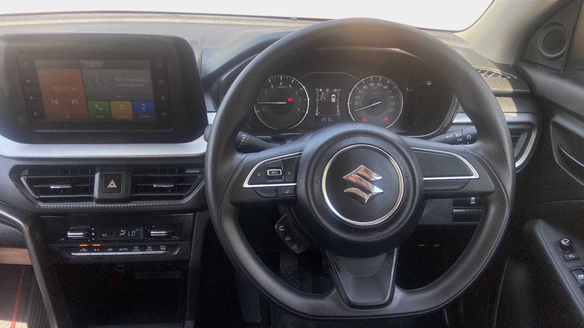 Interior dashboard view of a Maruti Suzuki Brezza