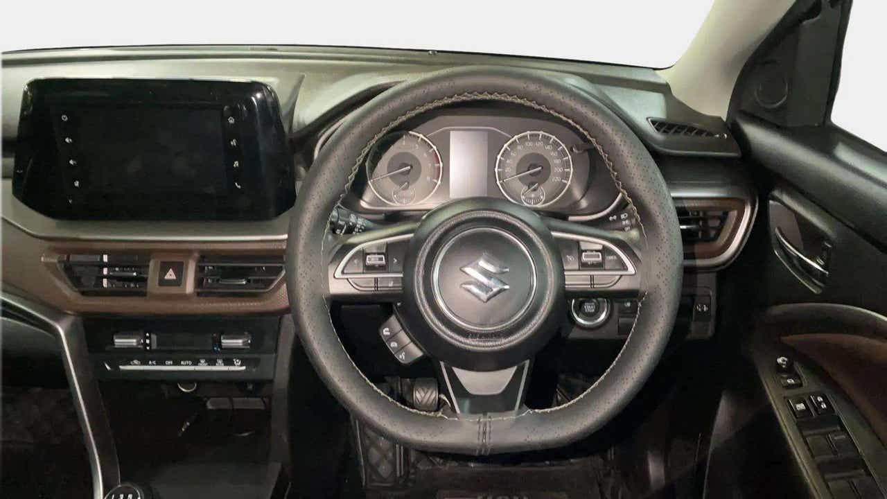 Interior dashboard view of a Maruti Suzuki Brezza