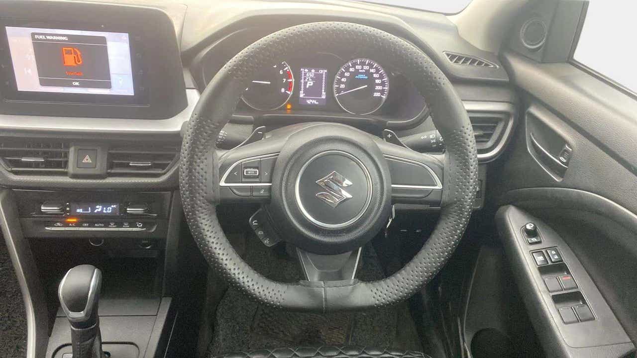 Driver cockpit view of a Maruti Suzuki Brezza