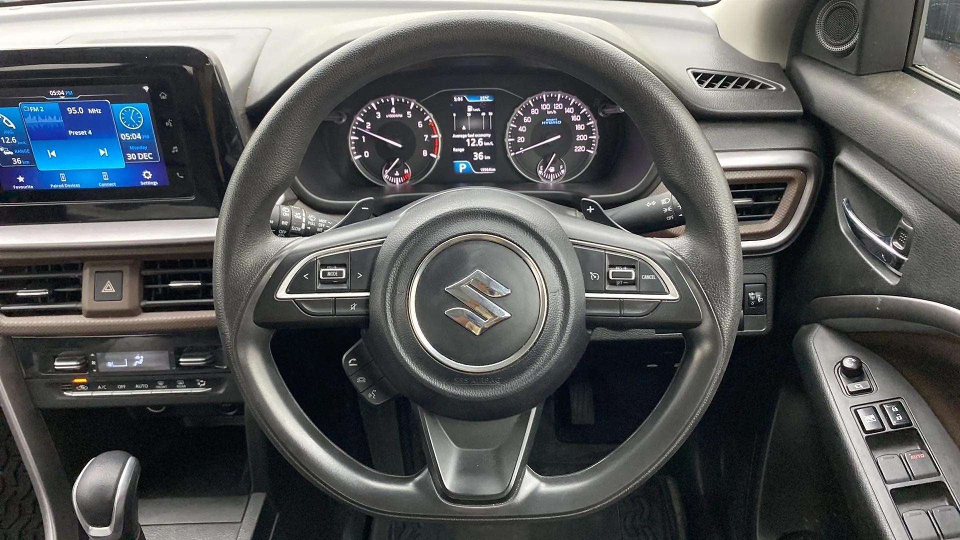 Dashboard and steering wheel of a Maruti Suzuki Brezza