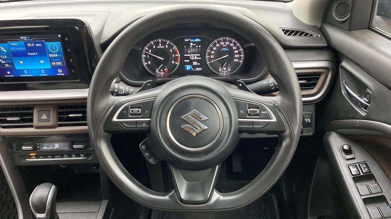 Dashboard and steering wheel of a Maruti Suzuki Brezza