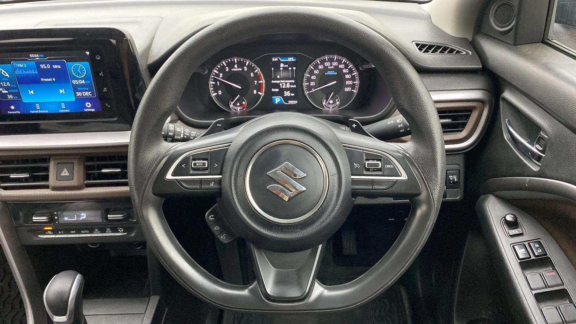 Dashboard and steering wheel of a Maruti Suzuki Brezza