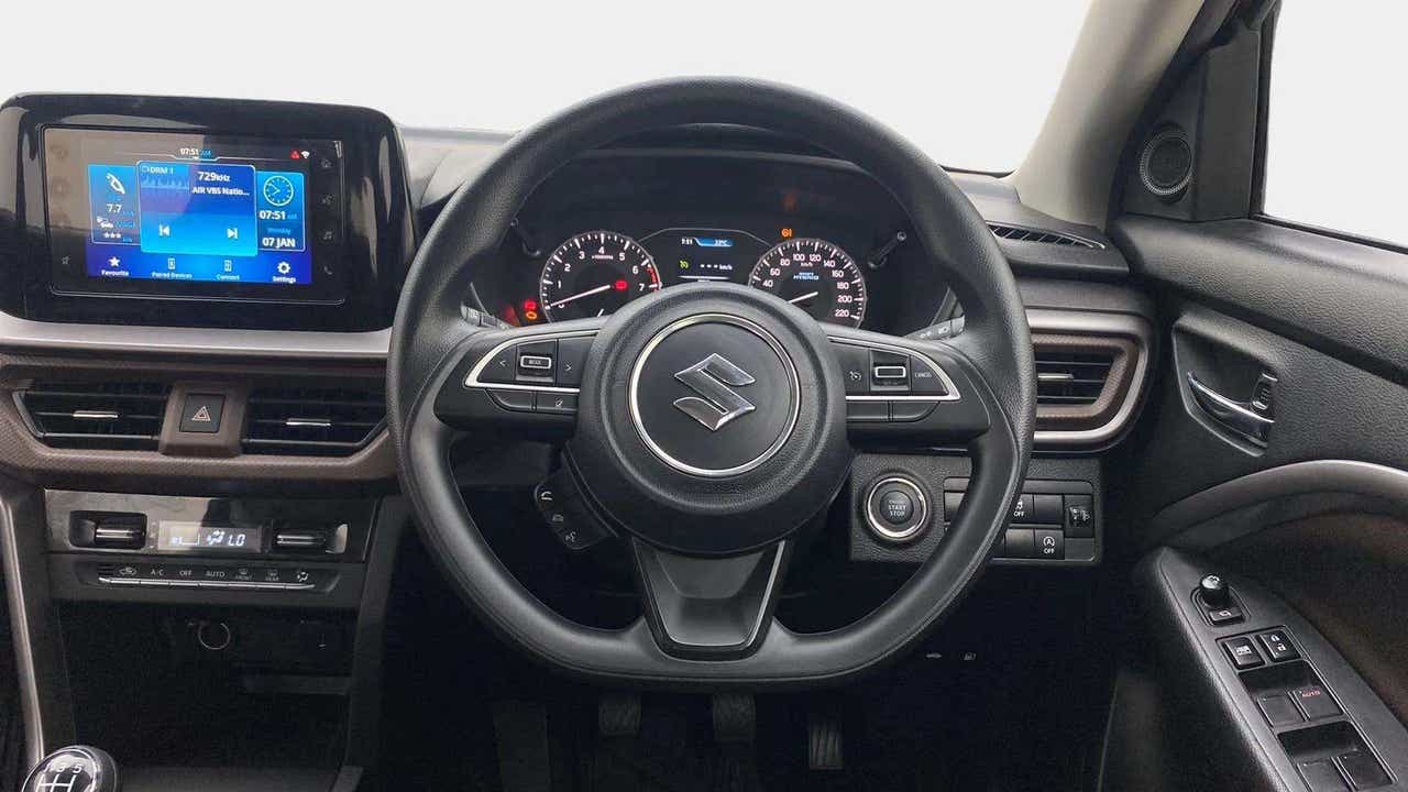 Dashboard and steering wheel of a Maruti Suzuki Brezza