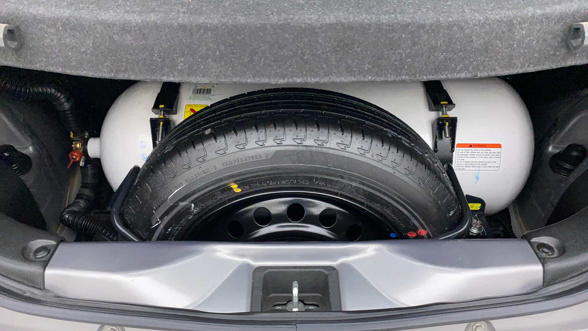 Cng tank and spare wheel in a Maruti Suzuki Celerio boot