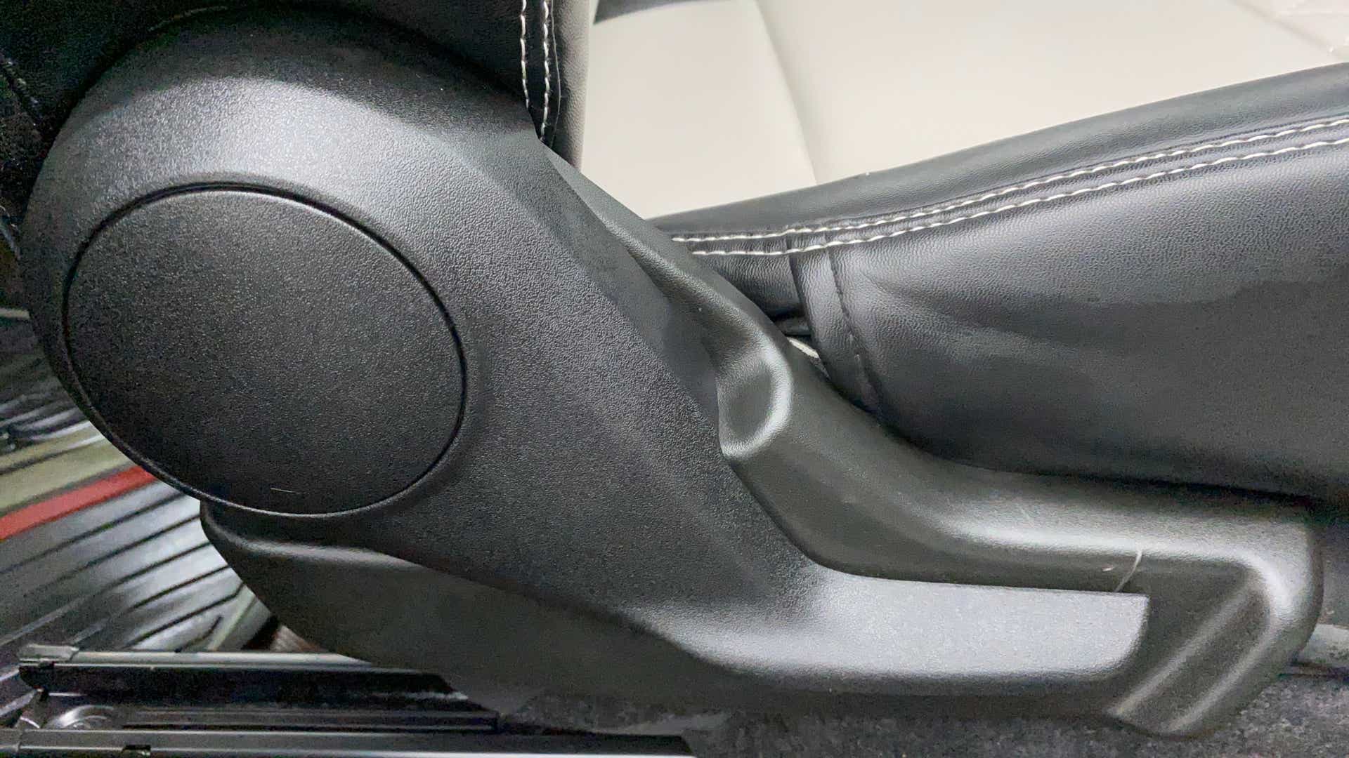 Seat adjustment lever of a Maruti Suzuki Celerio
