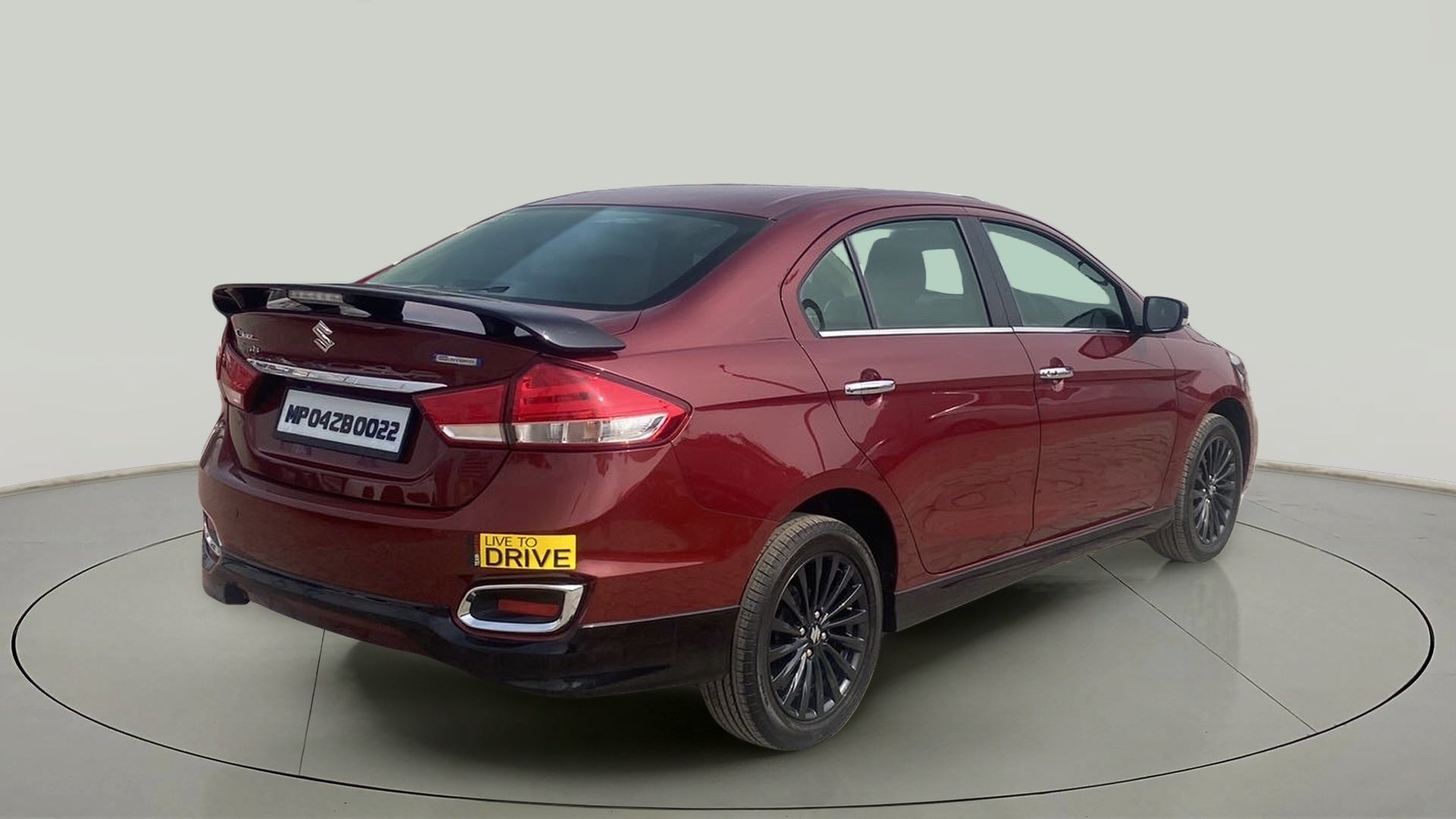 Rear three-quarter of a Maruti Suzuki Ciaz