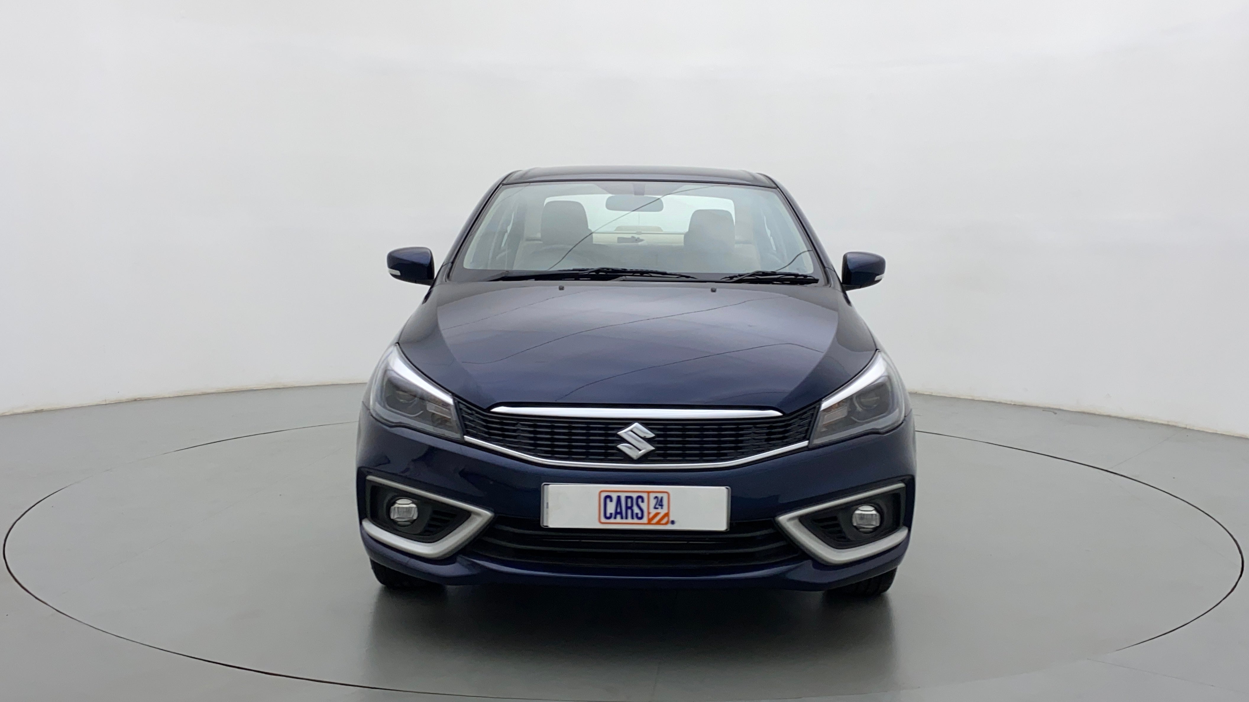 Front view of a Nexa Blue Maruti Suzuki Ciaz