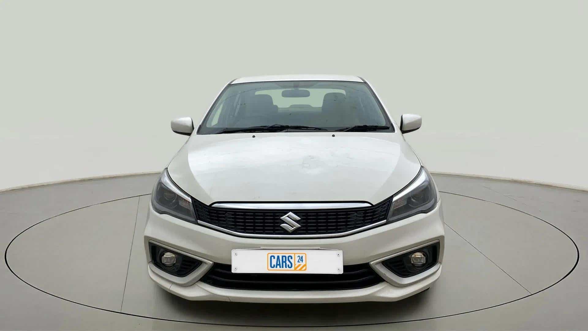 Front view of a Pearl Arctic White Maruti Suzuki Ciaz