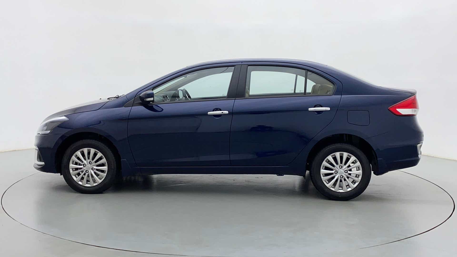 Side view of a Nexa Blue Maruti Suzuki Ciaz