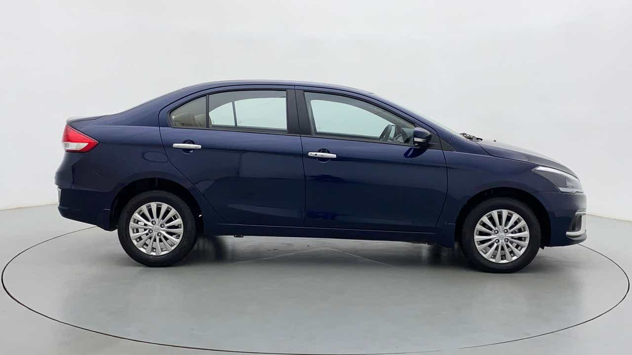 Side view of a Nexa Blue Maruti Suzuki Ciaz