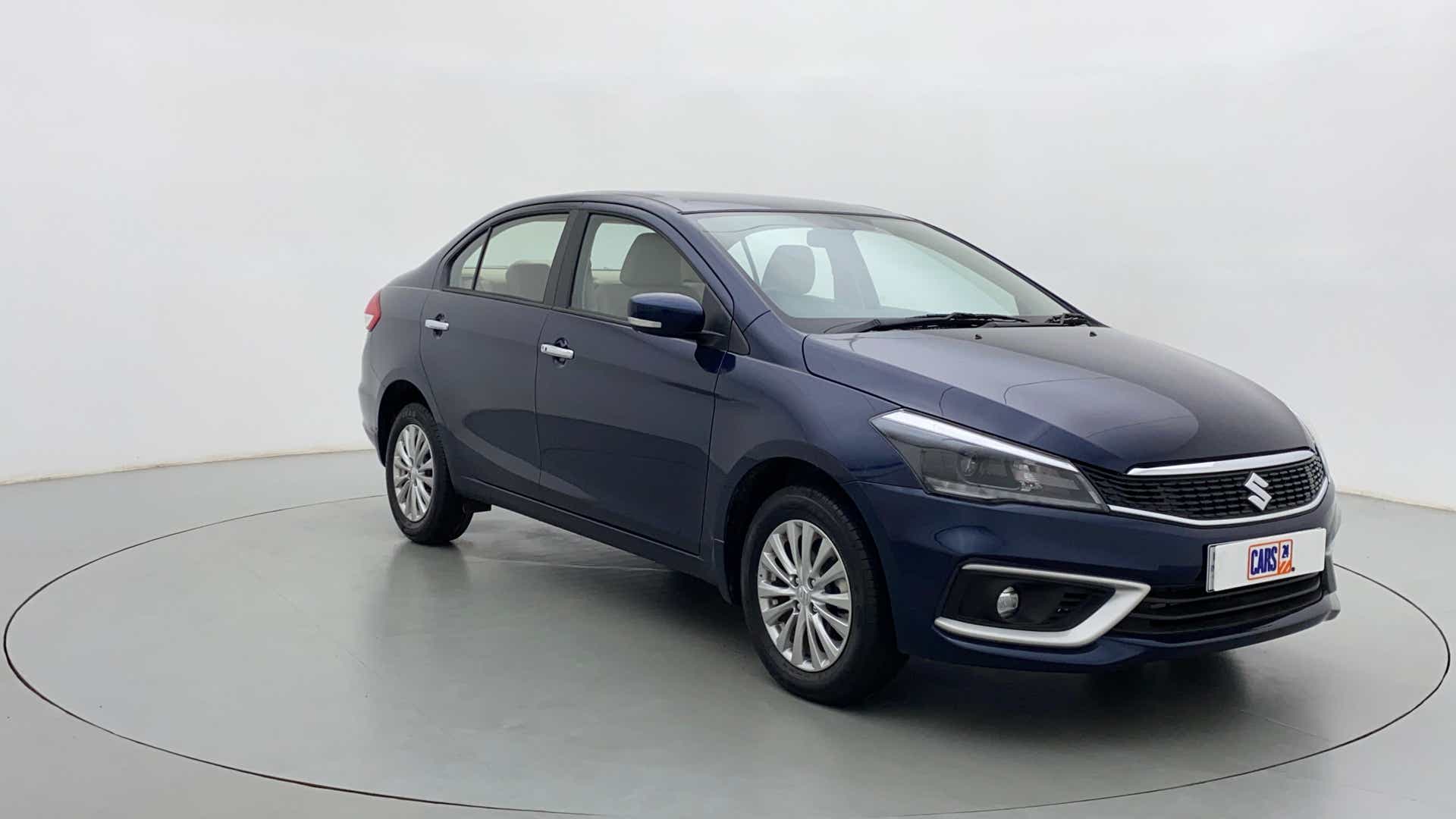 Front three-quarter view of a Nexa Blue Maruti Suzuki Ciaz