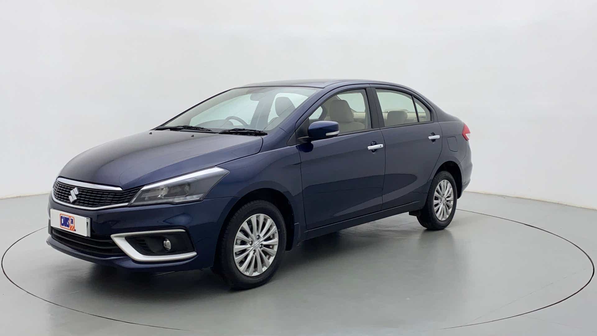 Front three-quarter view of a Nexa Blue Maruti Suzuki Ciaz