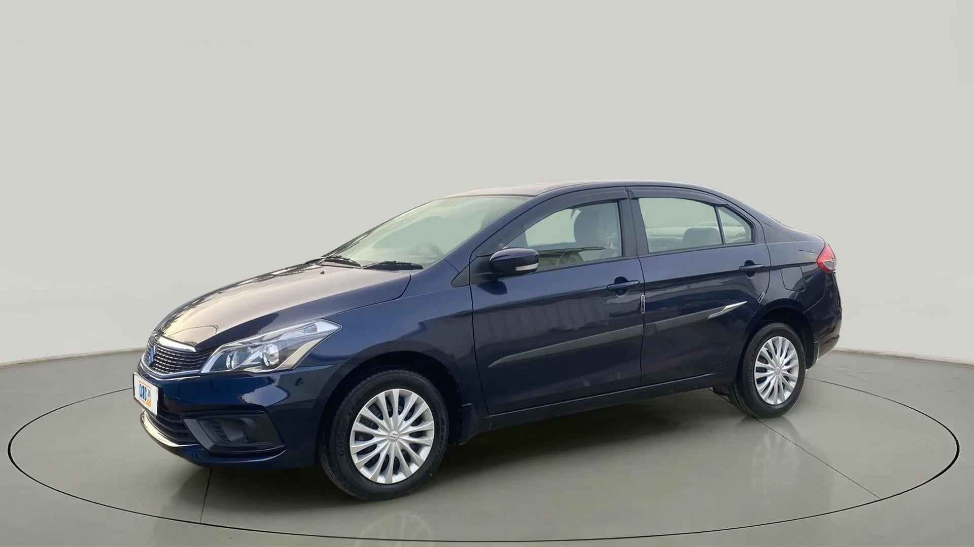 Front three-quarter view of a Nexa Blue Maruti Suzuki Ciaz