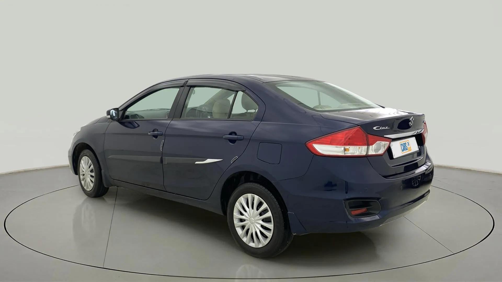 Rear three-quarter view of a Nexa Blue Maruti Suzuki Ciaz