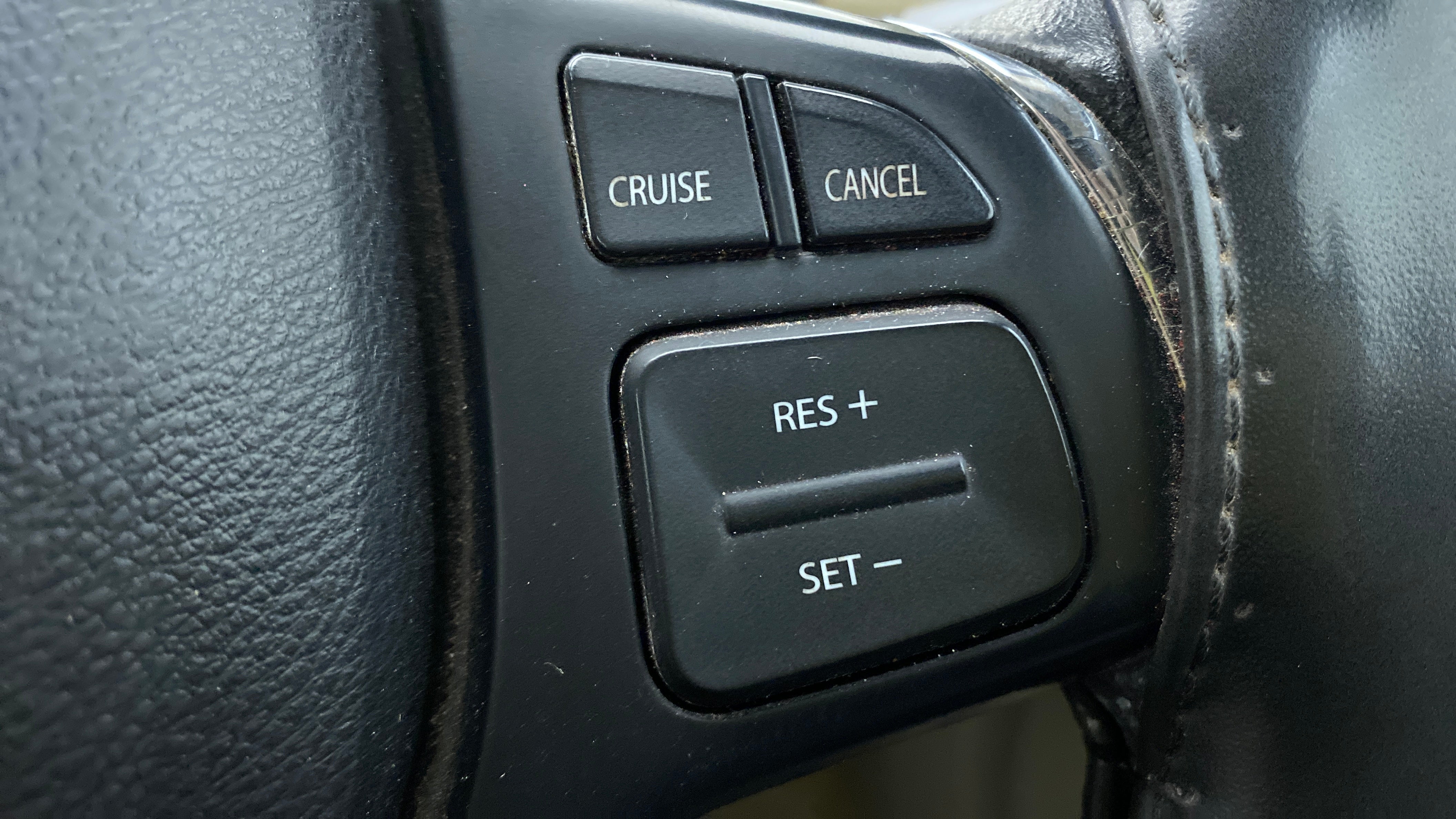 Cruise control buttons on a Maruti Suzuki Ciaz steering wheel