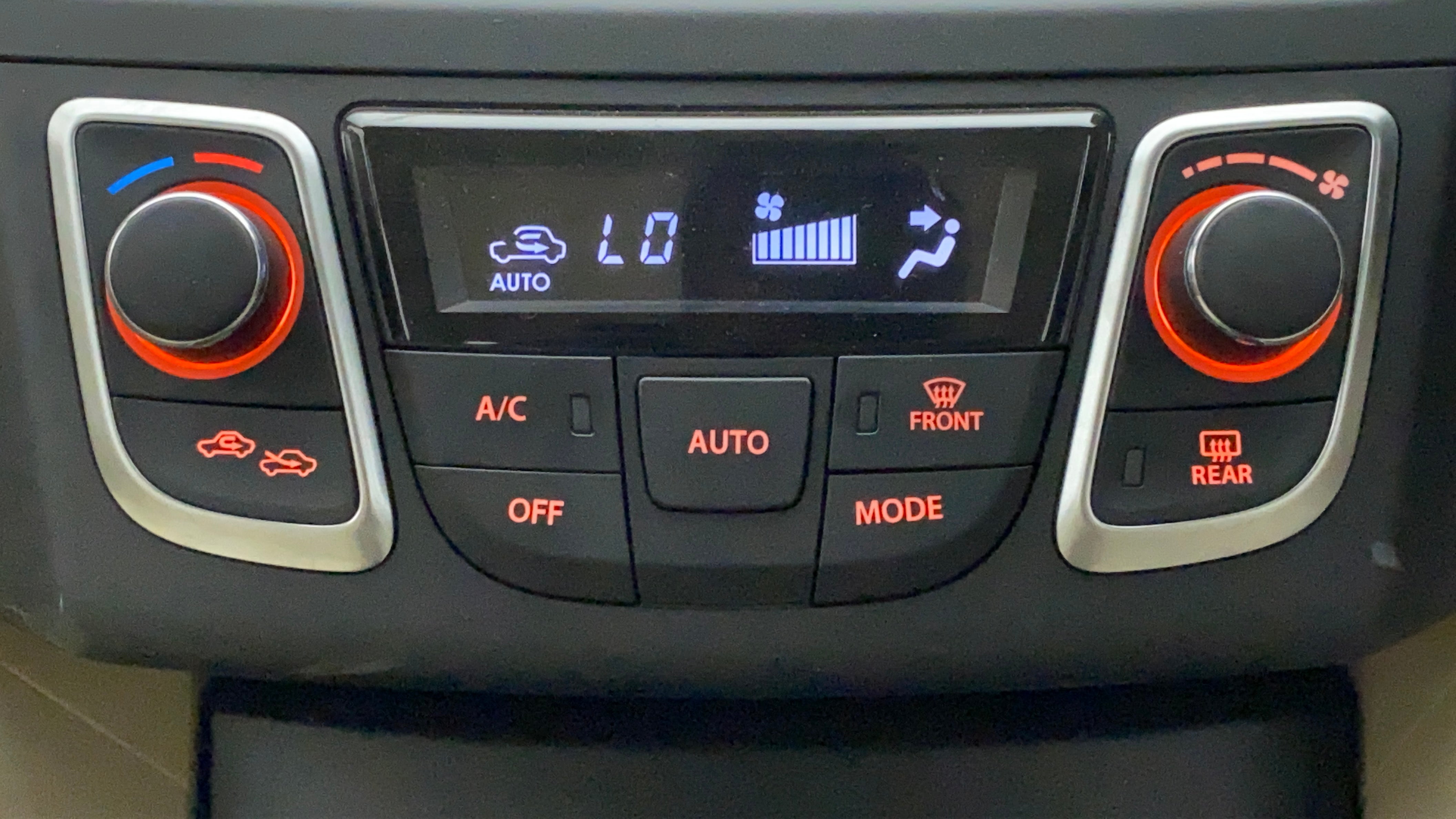 Dashboard automatic climate control panel of a Maruti Suzuki Ciaz
