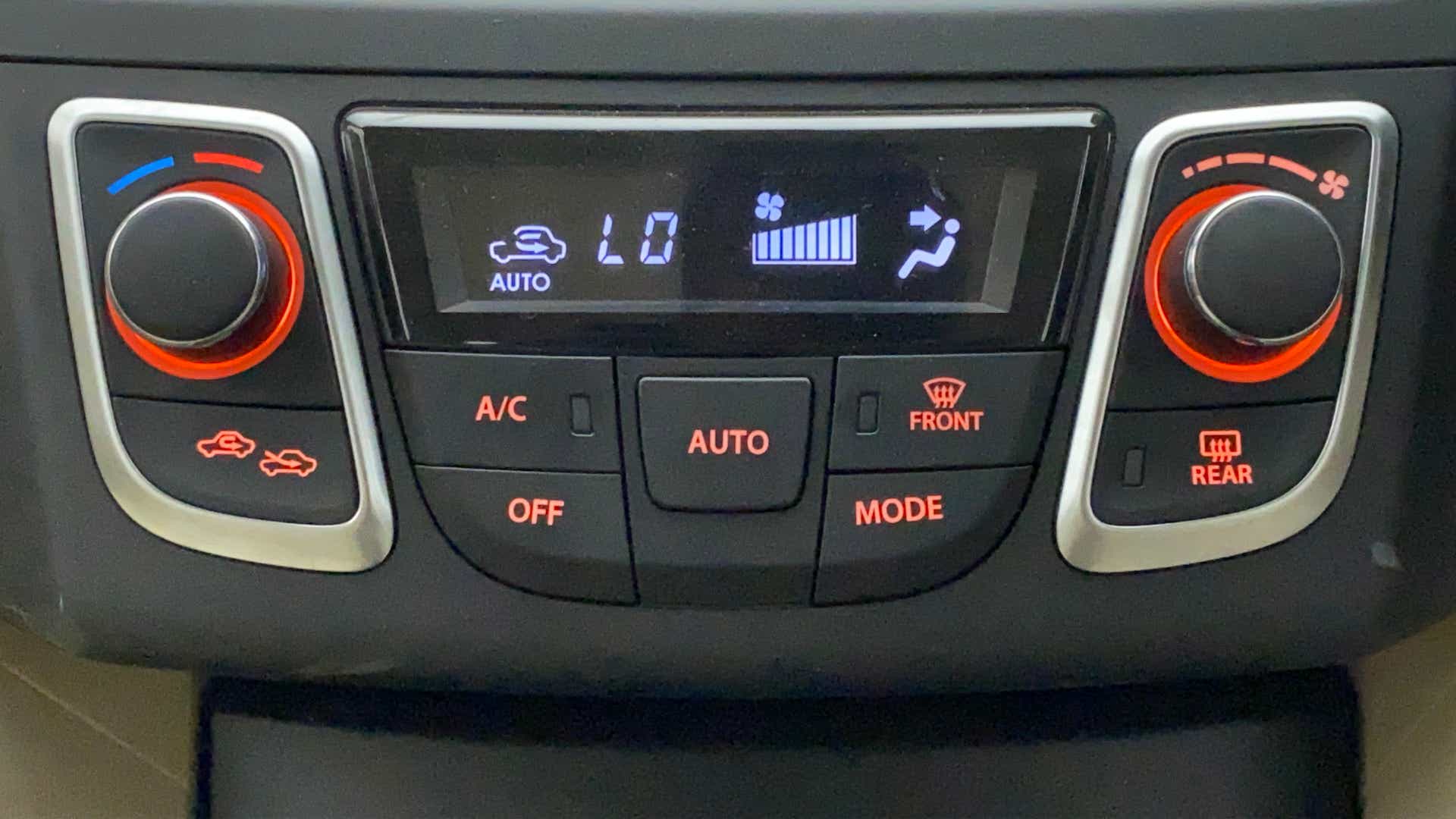 Dashboard automatic climate control panel of a Maruti Suzuki Ciaz