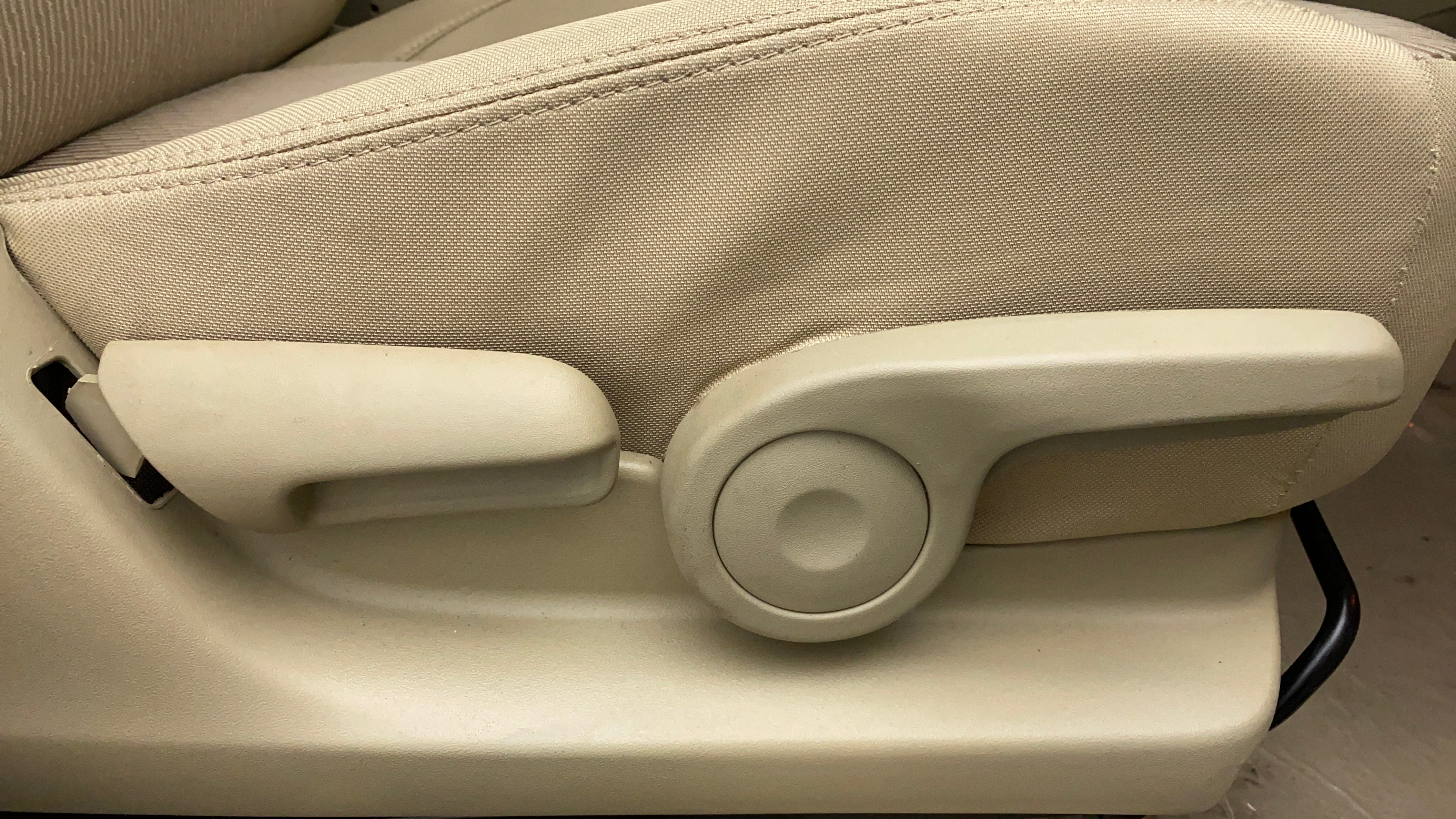 Close-up of seat adjustment lever of a Maruti Suzuki Ciaz