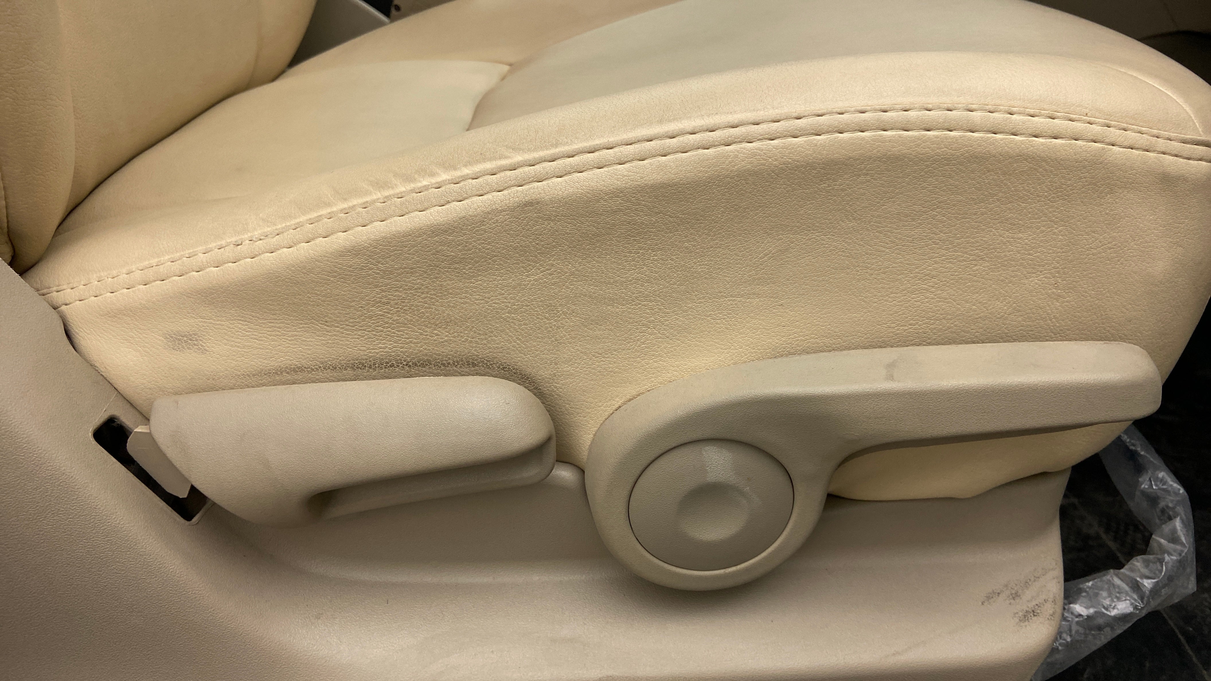 Driver seat side adjustment lever of a Maruti Suzuki Ciaz