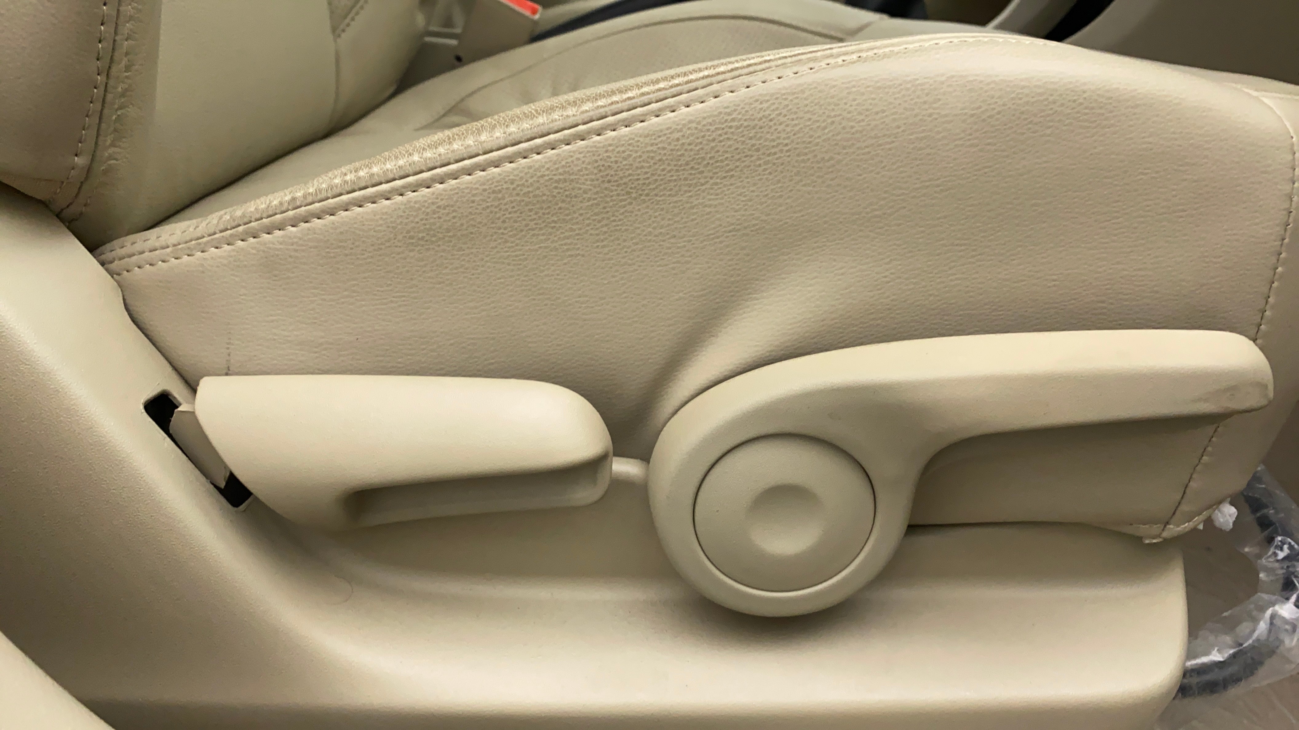 Close-up of front seat adjustment controls of a Maruti Suzuki Ciaz