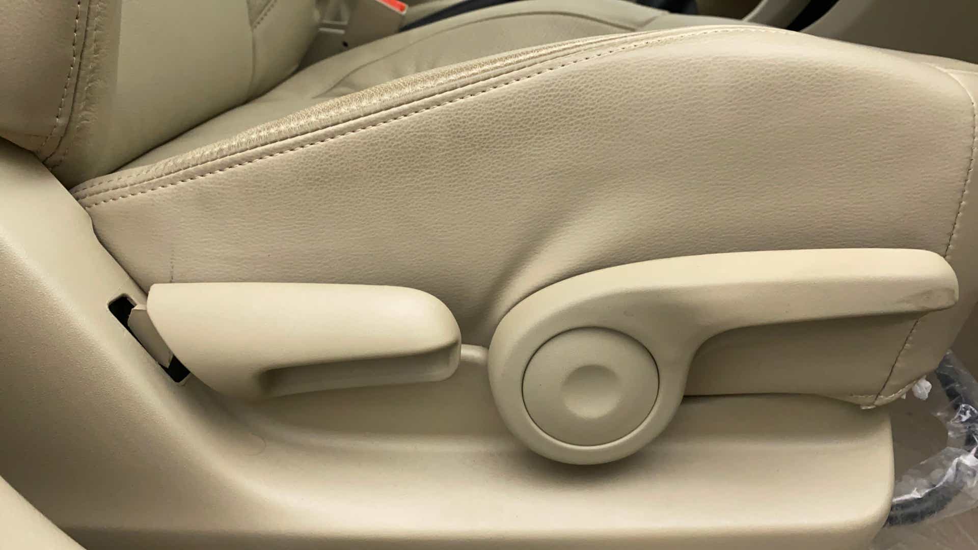 Close-up of front seat adjustment controls of a Maruti Suzuki Ciaz