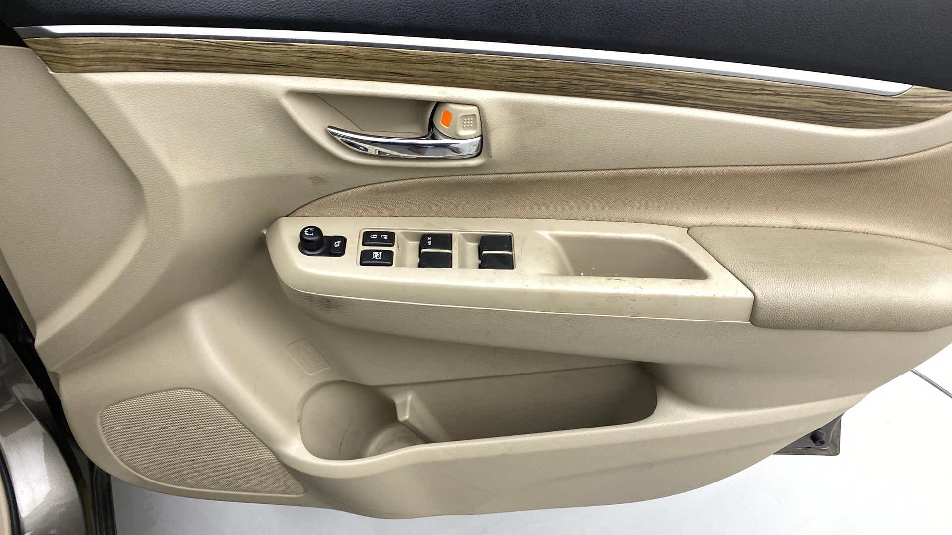 Interior driver side door panel of a Maruti Suzuki Ciaz