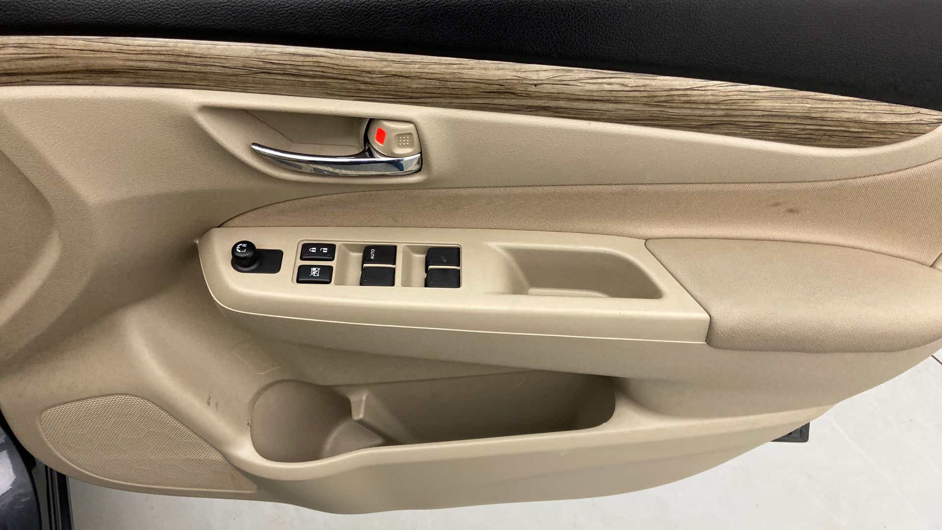 Front driver side door controls of a Maruti Suzuki Ciaz