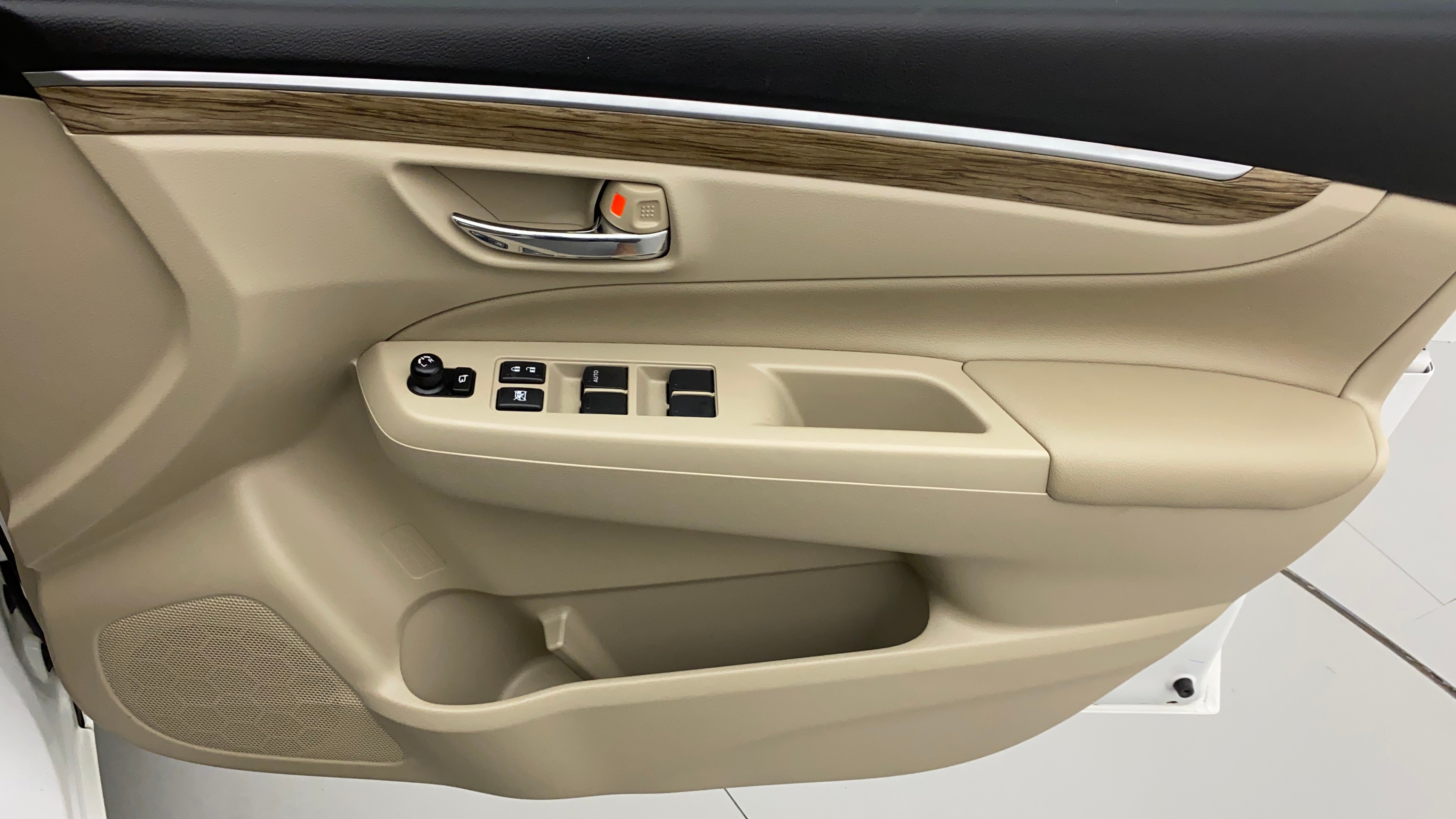 Interior door panel of a Maruti Suzuki Ciaz