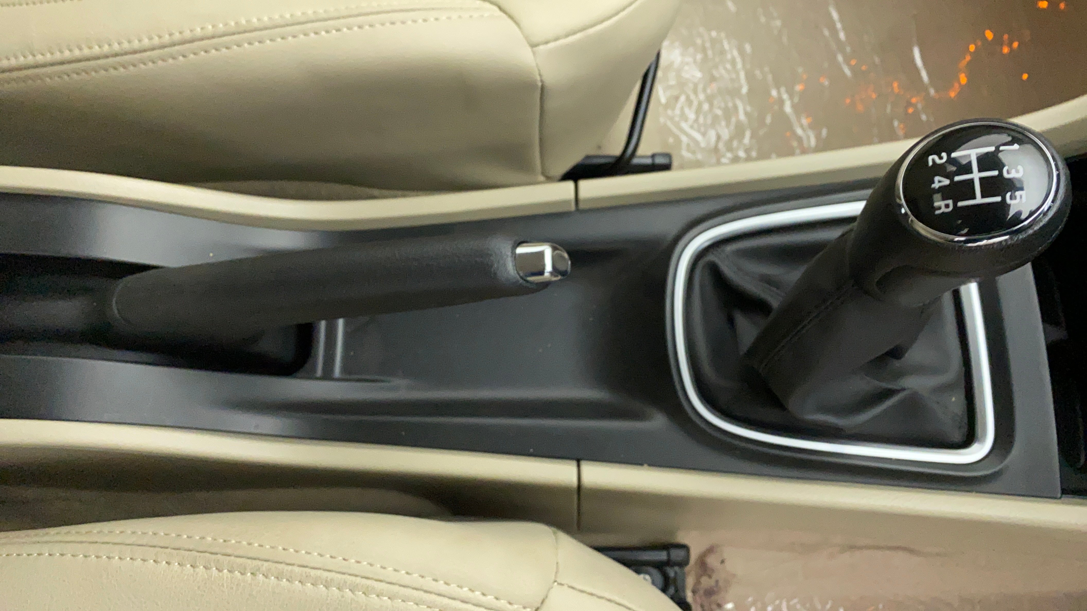 Manual gearbox and handbrake area of a Maruti Suzuki Ciaz