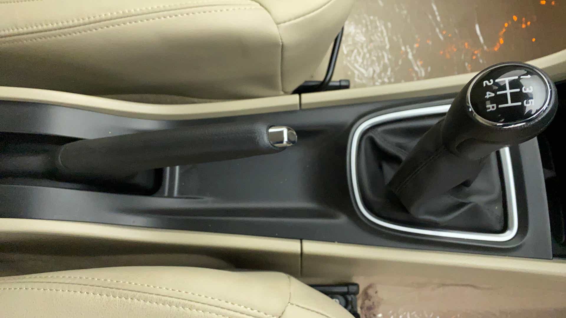 Manual gearbox and handbrake area of a Maruti Suzuki Ciaz
