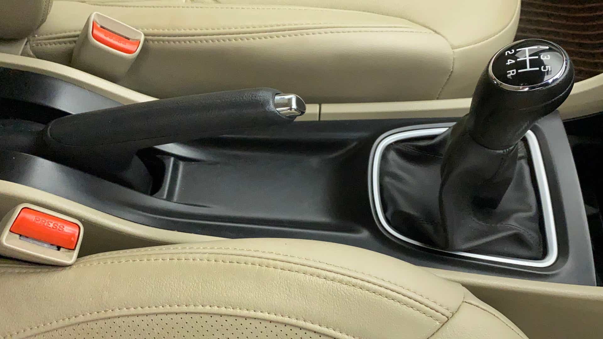 Gearshift and handbrake area of a Maruti Suzuki Ciaz