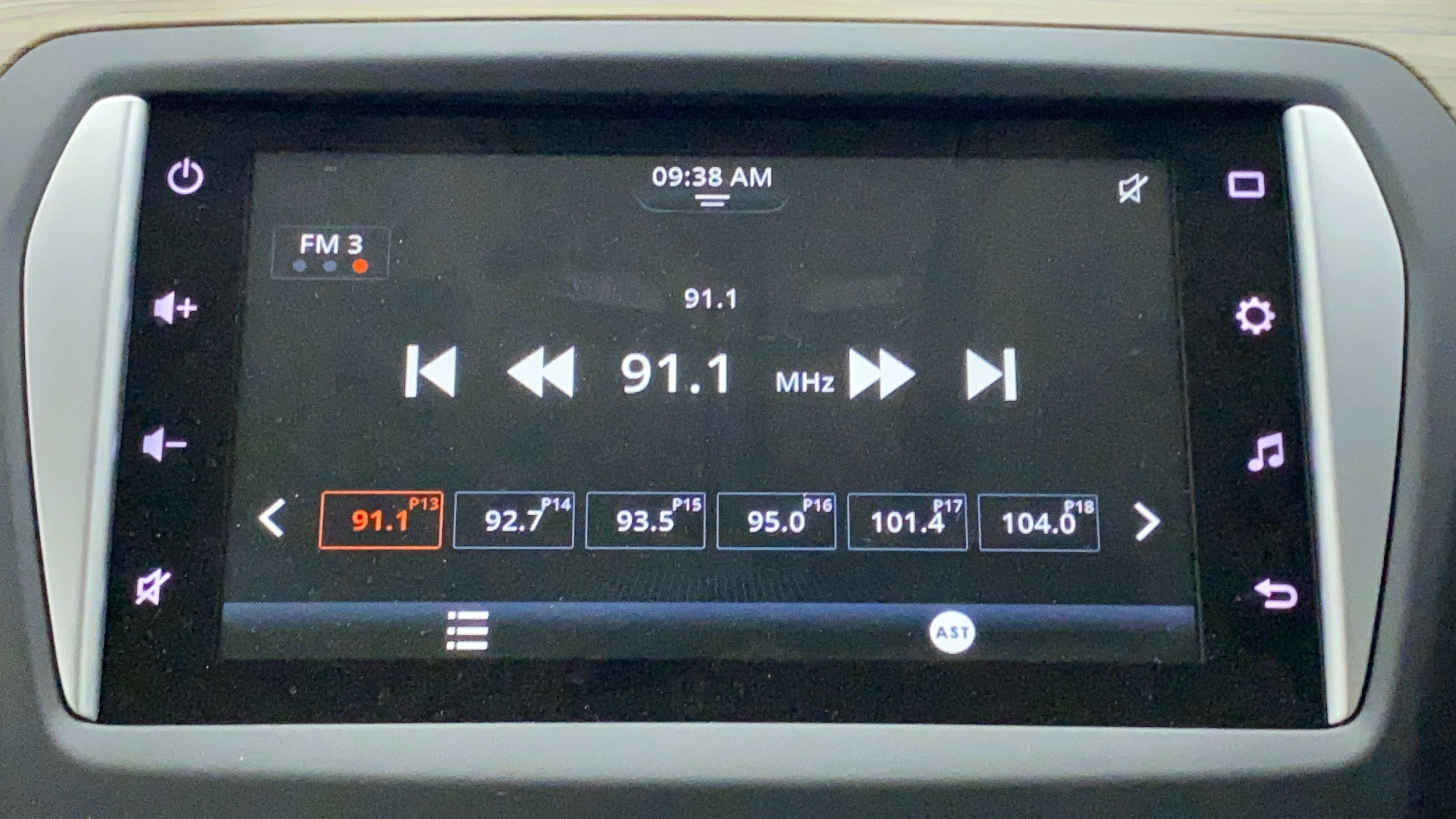 Car infotainment system showing the dashboard radio screen of a Maruti Suzuki Ciaz.