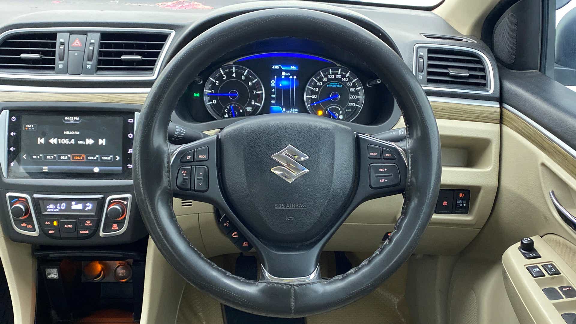 Interior dashboard and steering wheel of a Maruti Suzuki Ciaz
